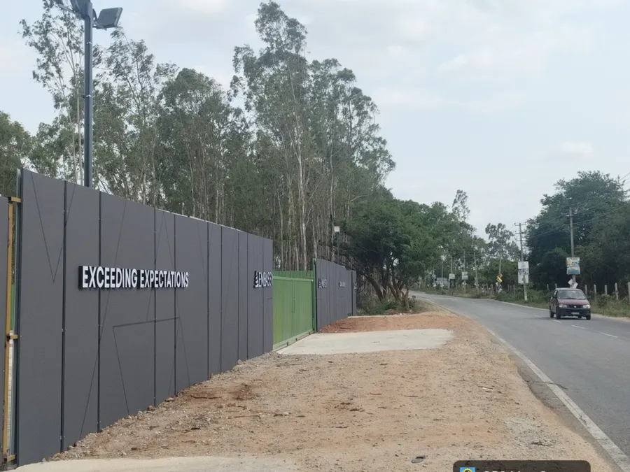 Embassy Knowledge Park Approach Road — July 2026 Newly laid approach road and perimeter lighting at Embassy Knowledge Park, Tharahunise — July 2026